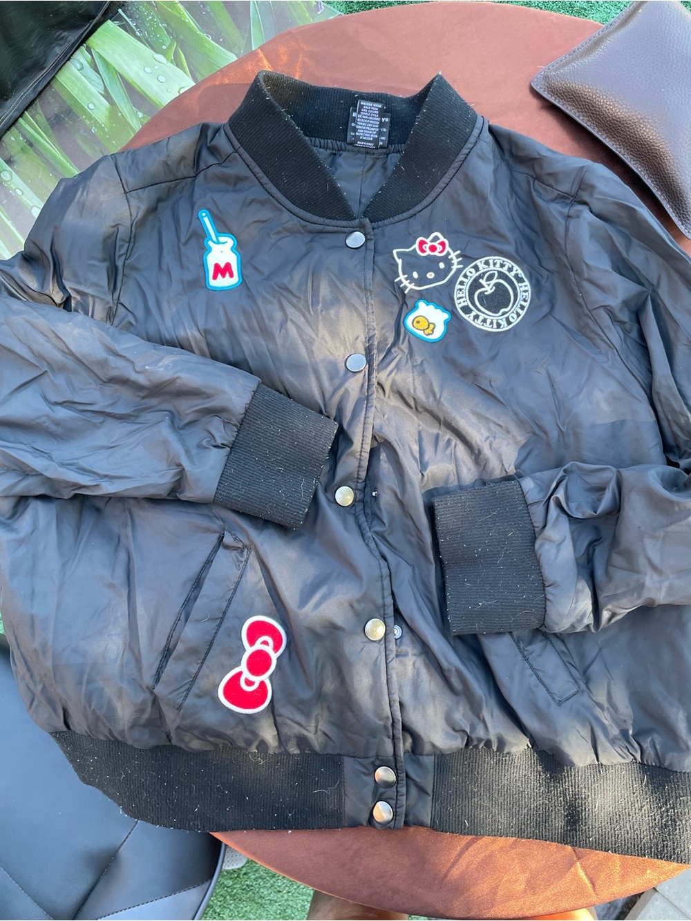 Hello Kitty Black Puffer Jacket with Patch Details